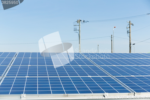 Image of Solar panel and power line