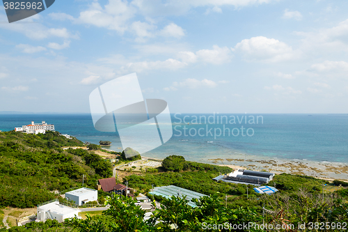 Image of Okinawa village with clear blue sky