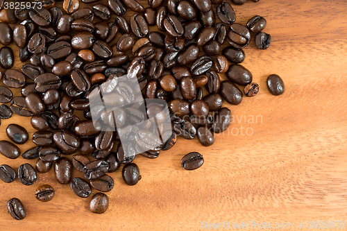 Image of Coffee on grunge wooden background