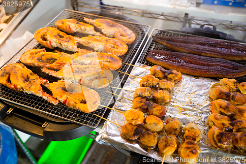 Image of BBQ lobster and scallop at fish market