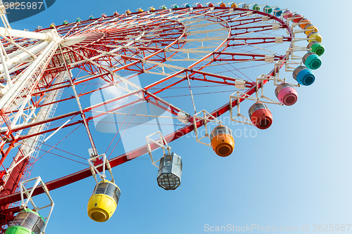 Image of Big Ferris wheel with blue sky