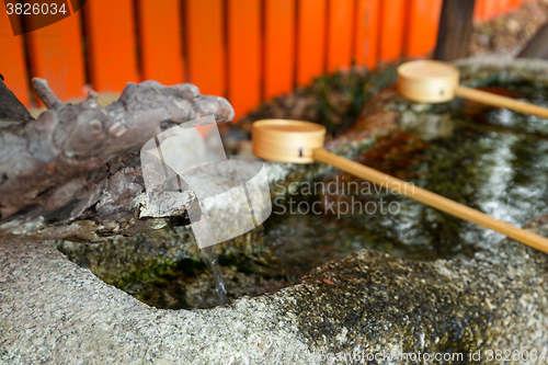 Image of Ladles used for purification of the hands at Japanese temples