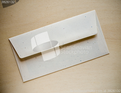 Image of Letter envelope on wood table