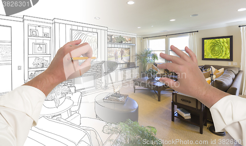 Image of Hands Drawing Living Room Design Gradating Into Photograph