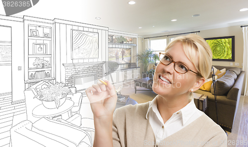 Image of Woman With Pencil Over Living Room Design Drawing and Photo