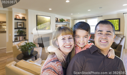 Image of Young Mixed Race Family Portrait In Living Room of Home