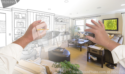 Image of Hands Drawing Living Room Design Gradating Into Photograph