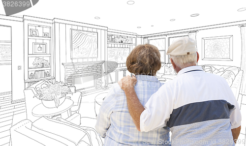 Image of Senior Couple Looking Over Custom Living Room Design Drawing