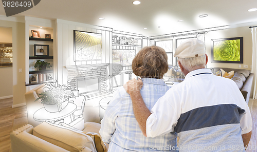 Image of Senior Couple Looking Over Custom Living Room Design Drawing Pho