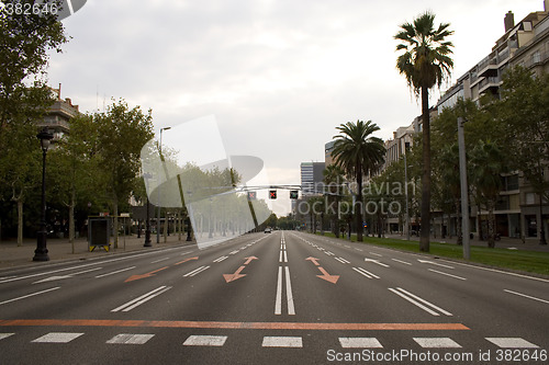 Image of Empty road on the crowded city