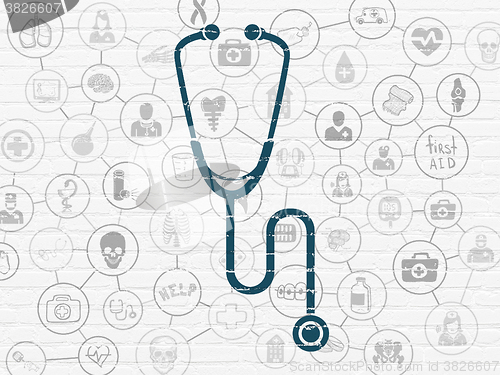 Image of Health concept: Stethoscope on wall background