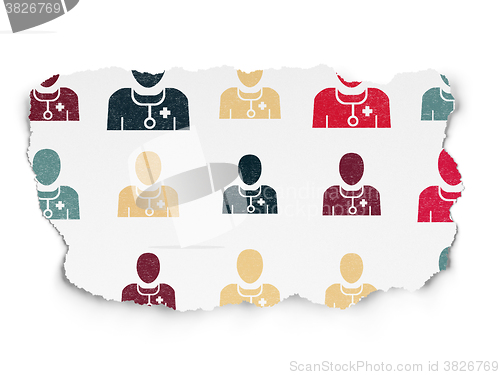 Image of Healthcare concept: Doctor icons on Torn Paper background