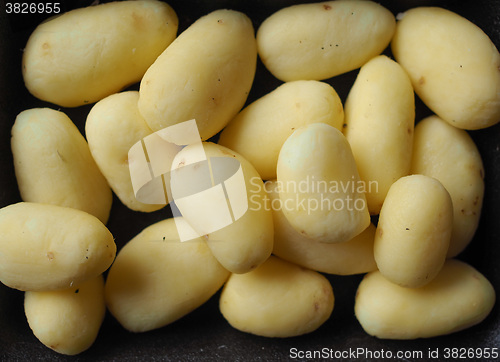 Image of Potato vegetables in a tub