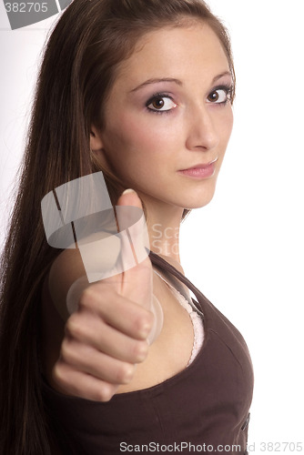 Image of woman shows thumb