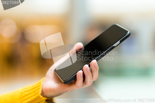 Image of woman using smart phone