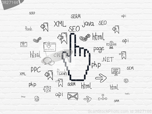 Image of Web design concept: Mouse Cursor on wall background