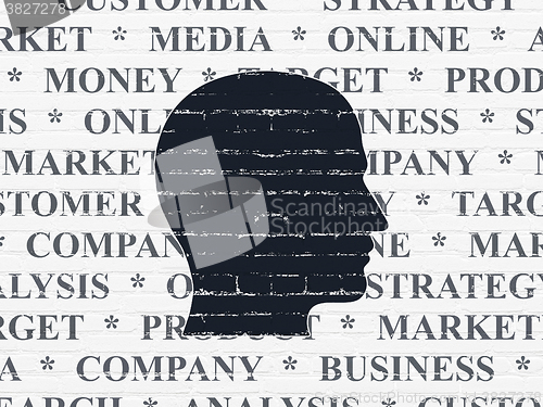 Image of Marketing concept: Head on wall background