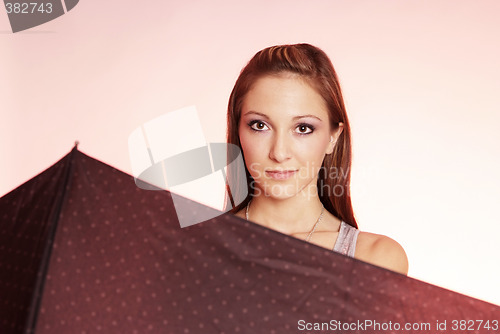 Image of woman with umbrella