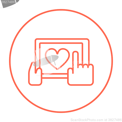 Image of Hands holding tablet with heart sign line icon.