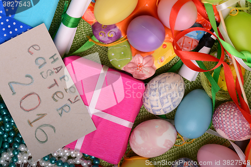 Image of easter eggs with flowers and gift box 