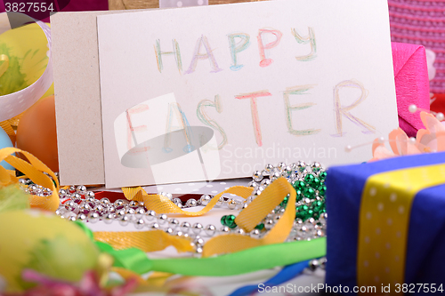 Image of Easter background with eggs, ribbons and spring decoration