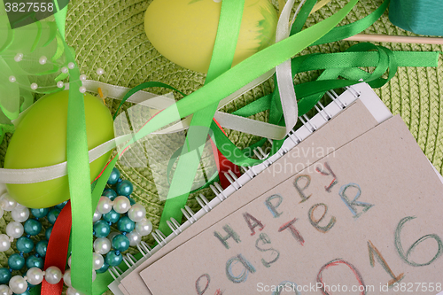 Image of Easter background with Easter eggs with spring flowers/ vintage easter card with basket