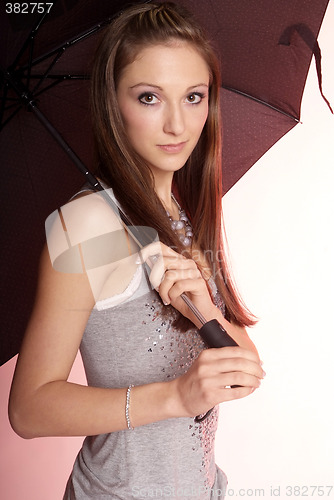 Image of woman with umbrella