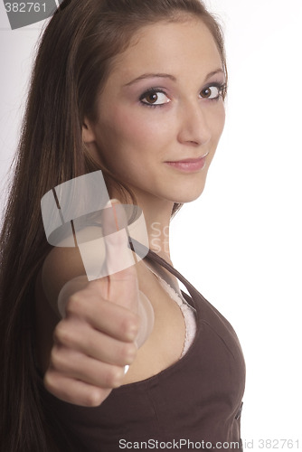 Image of woman shows thumb