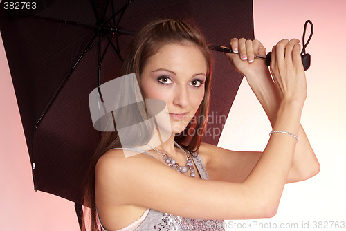 Image of woman with umbrella