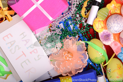 Image of Easter background with eggs, ribbons and spring decoration