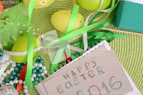 Image of Easter background with Easter eggs with spring flowers/ vintage easter card with basket