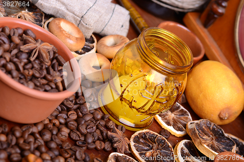 Image of coffee beans and candle lemon on old vintage background