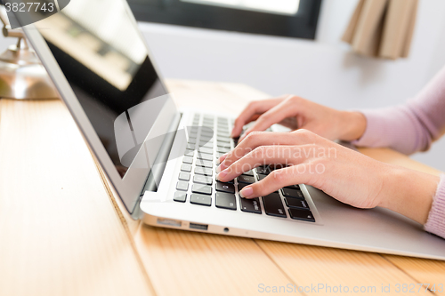 Image of Woman use of the laptop computer