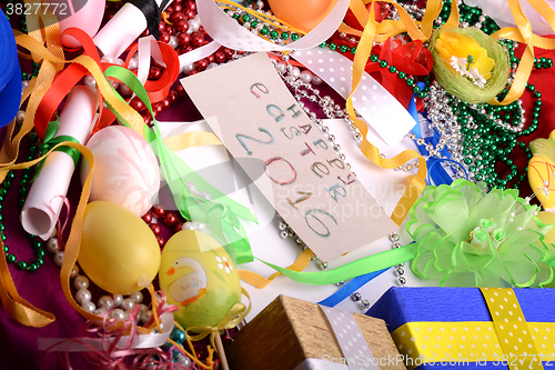 Image of Easter background with eggs, ribbons and spring decoration