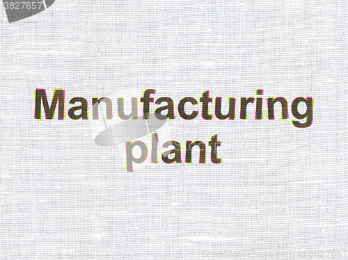Image of Manufacuring concept: Manufacturing Plant on fabric texture background