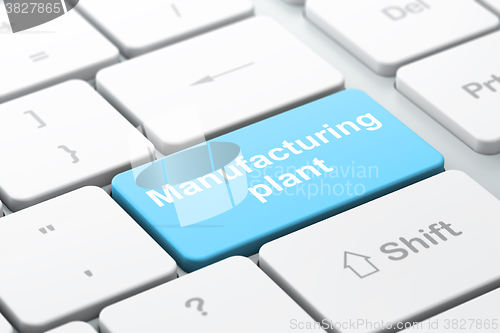 Image of Manufacuring concept: Manufacturing Plant on computer keyboard background