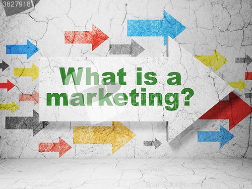 Image of Marketing concept: arrow with What is a Marketing? on grunge wall background