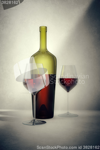 Image of red wine bottle with two glasses