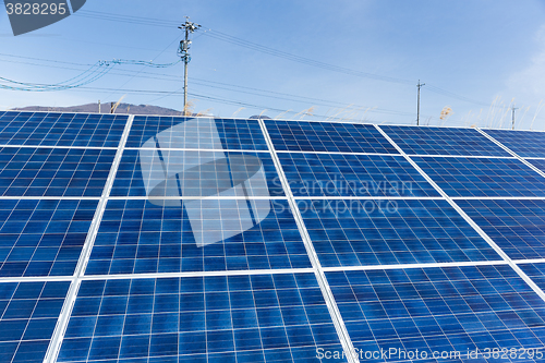 Image of Solar panel with power lines