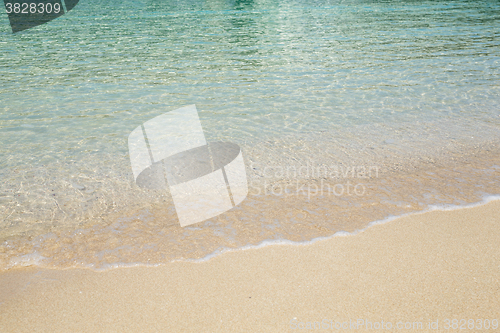 Image of Wave of the sea on the sand beach