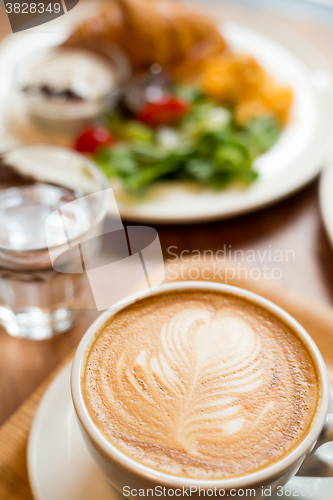 Image of Morning breakfast with salad and coffee