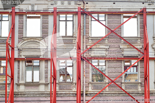 Image of restoration facade of old house