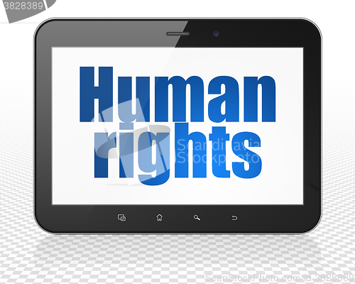 Image of Politics concept: Tablet Pc Computer with Human Rights on display