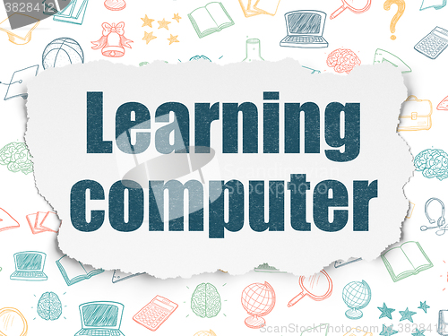 Image of Education concept: Learning Computer on Torn Paper background