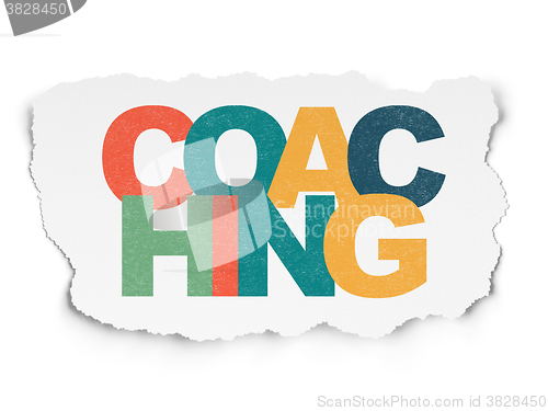 Image of Learning concept: Coaching on Torn Paper background