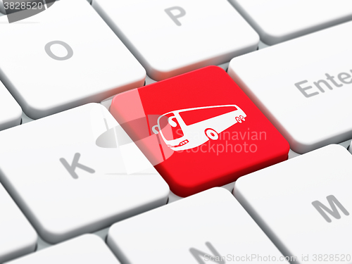 Image of Tourism concept: Bus on computer keyboard background