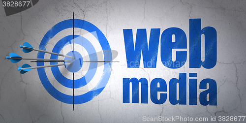 Image of Web development concept: target and Web Media on wall background