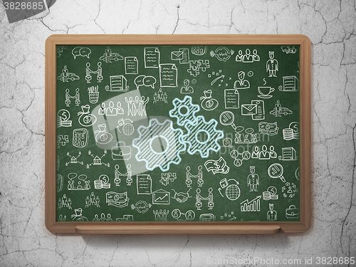 Image of Business concept: Gears on School Board background