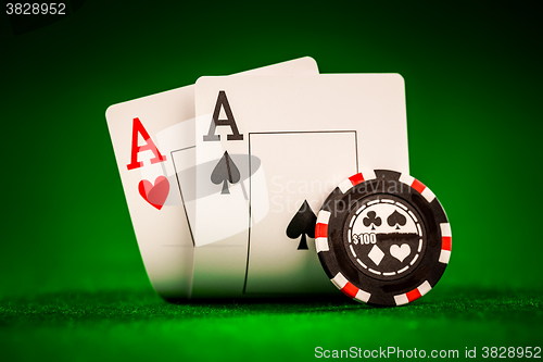 Image of chips and two aces