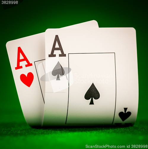 Image of chips and two aces